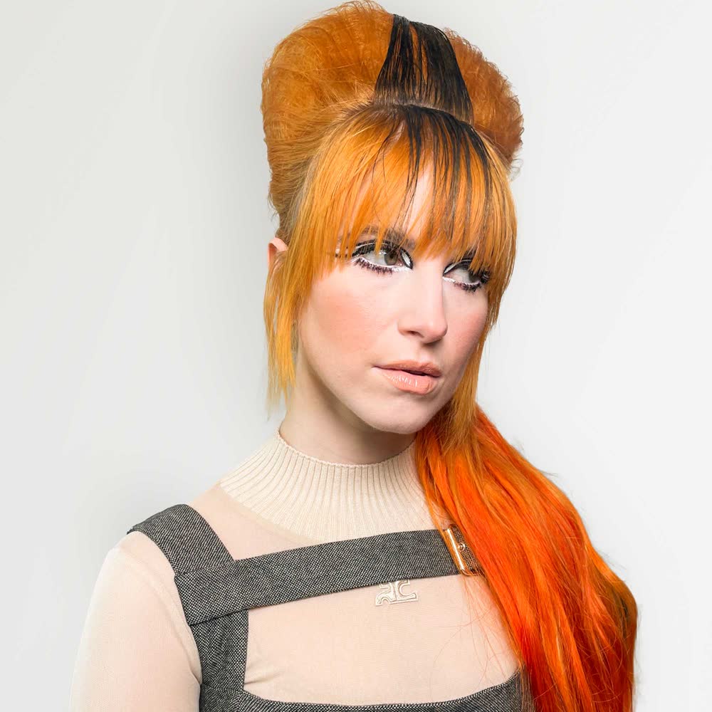 Hayley Williams with her two-toned black and orange beehive, from Paramore's This Is Why tour
