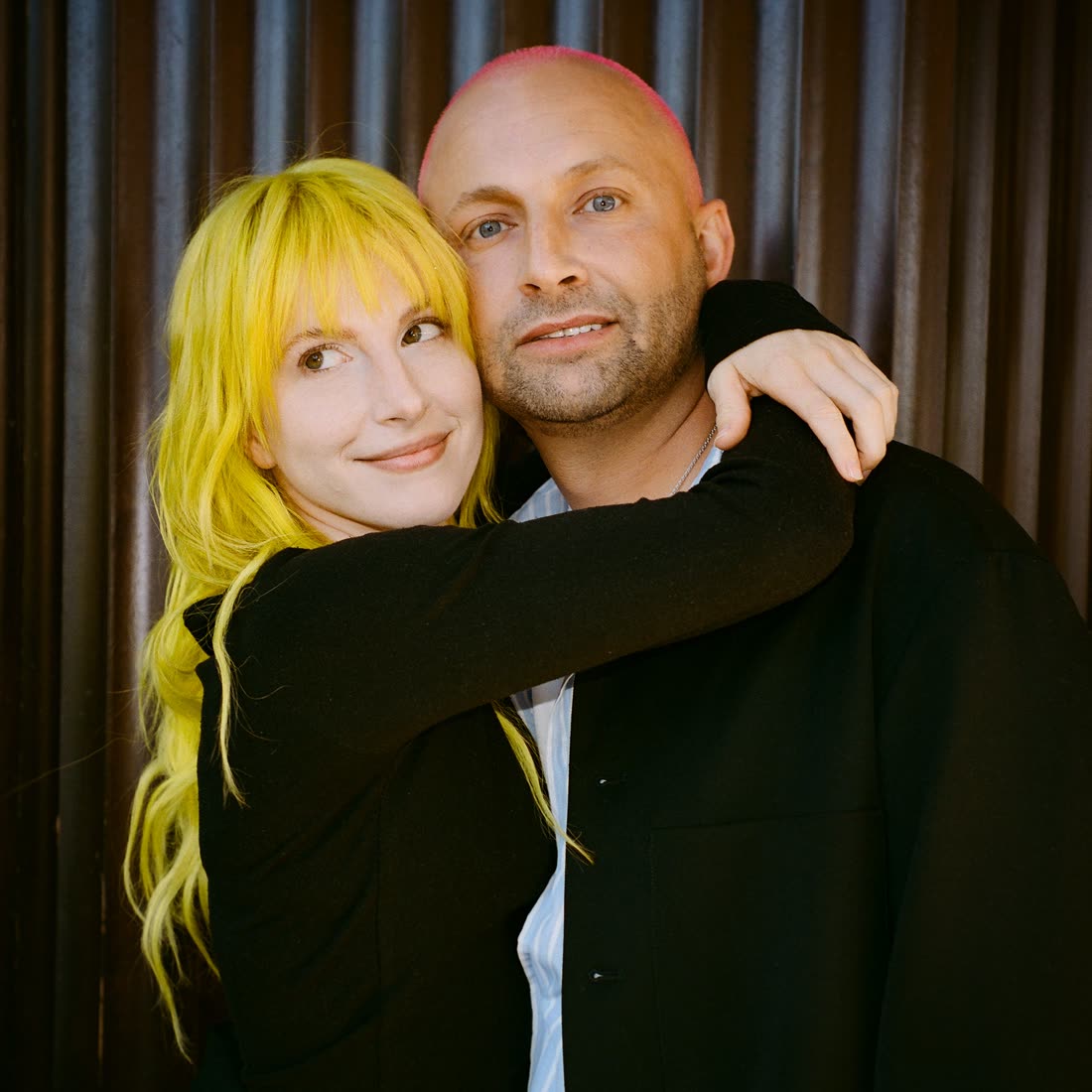 Hayley Williams and Brian O'Connor, arms around each other